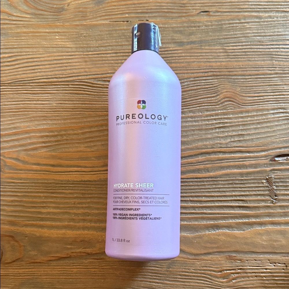 Pureology Hydrate Sheer Conditioner purple bottle 1 liter. Never open